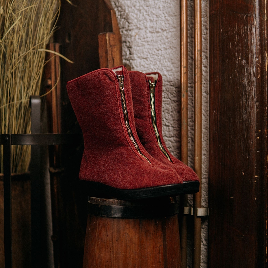 Dames omasloffen van schapenwol met rits, rood