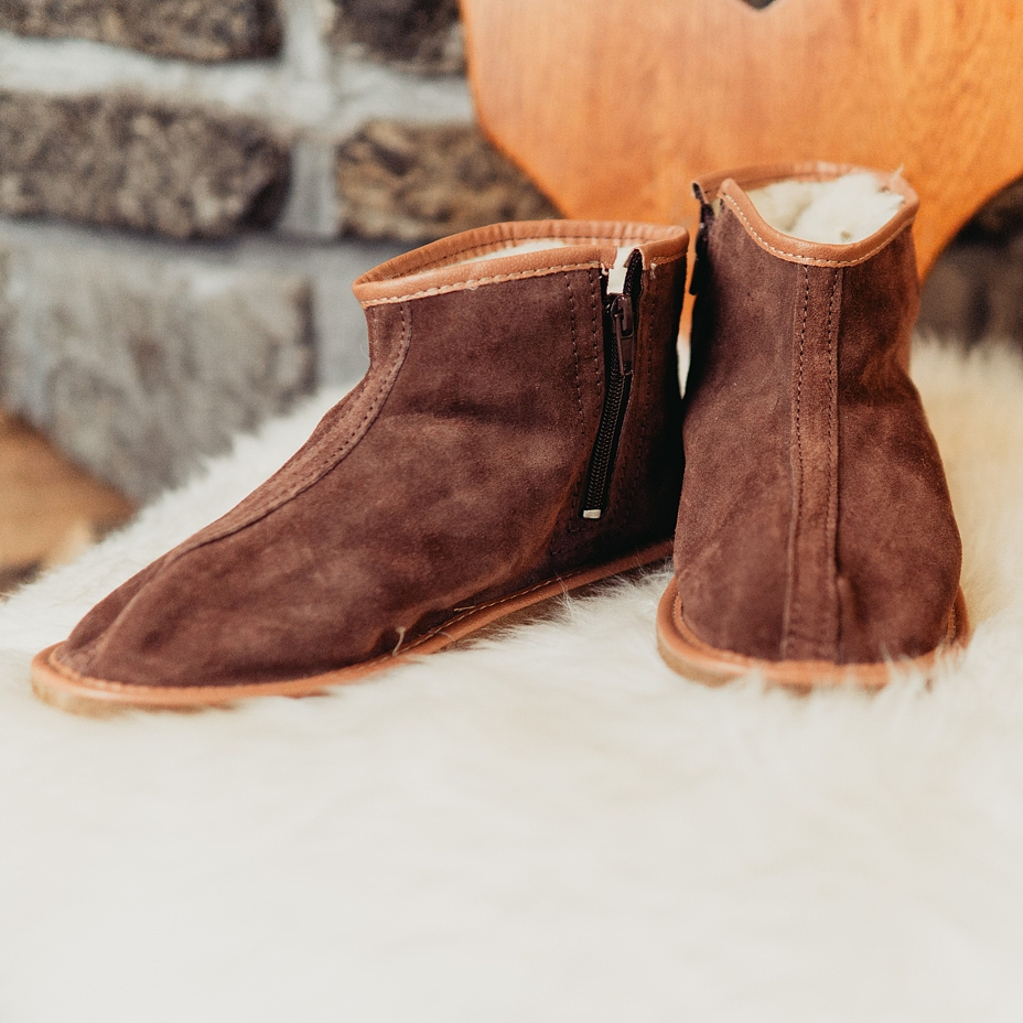 Enkel lederen pantoffels met schapenwol met rits